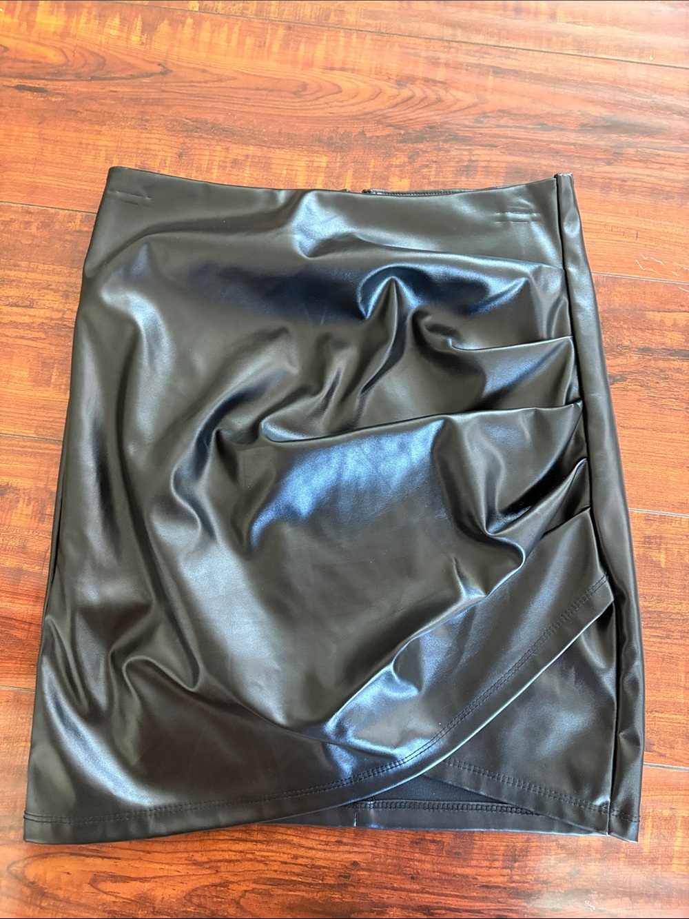 Sleek Black Faux Leather Ruched Mini Skirt